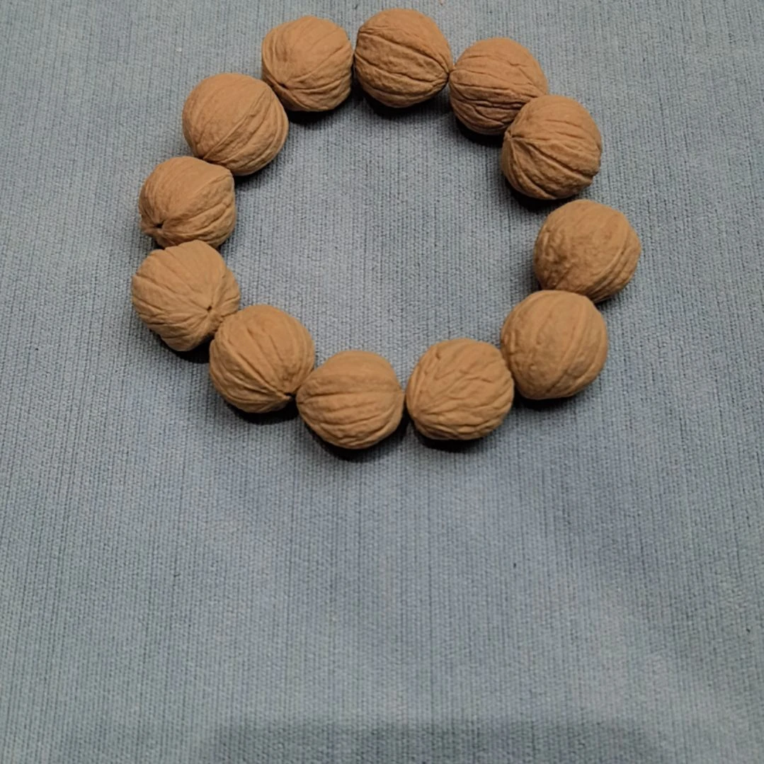 恩***壹吊坠猴头核桃大灯笼肉眼挑12颗，打孔不退