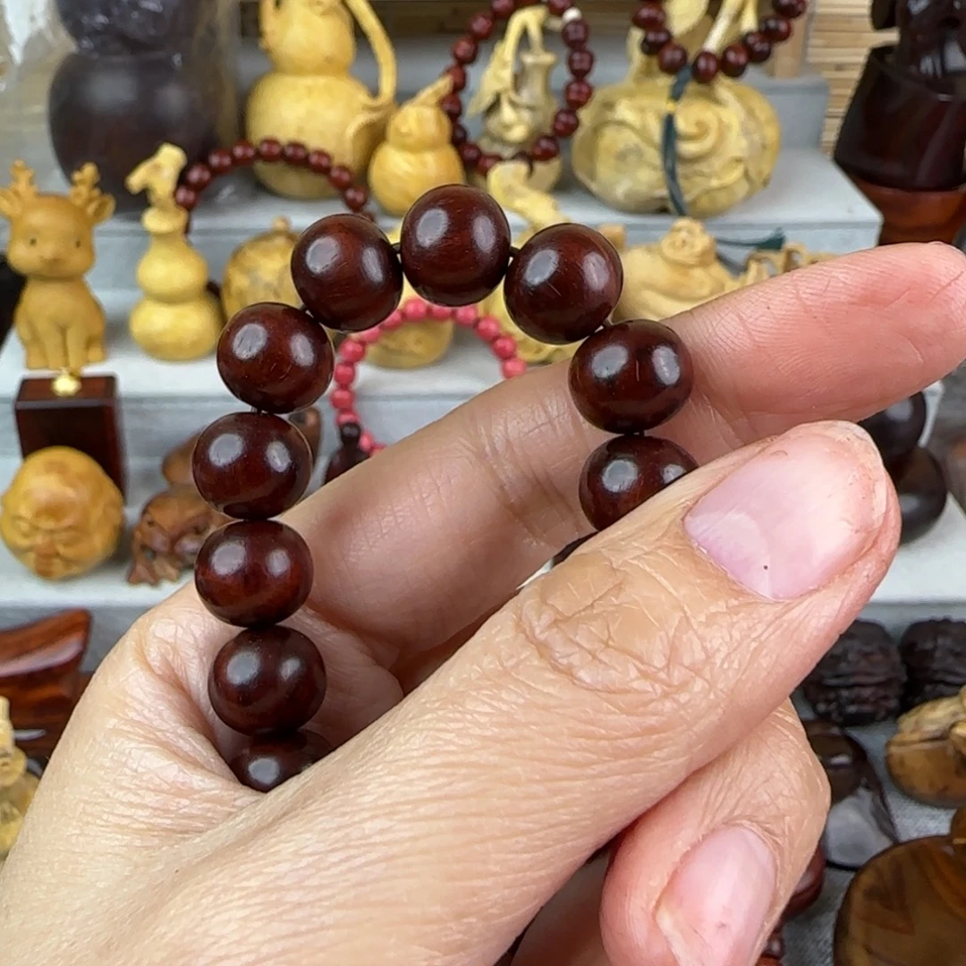 大***袍木小叶紫檀雕刻糖蜜把件