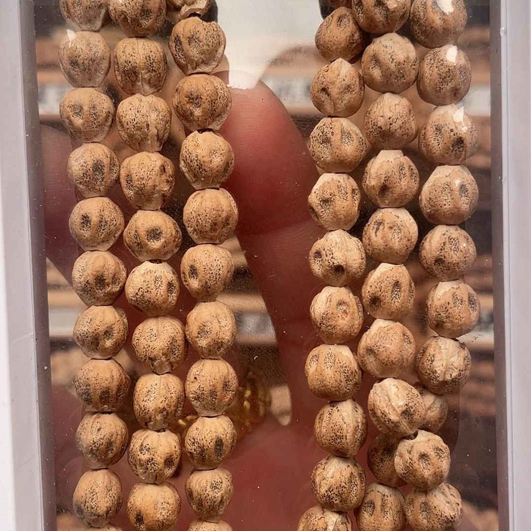 柏香籽/百香籽吊坠金**人