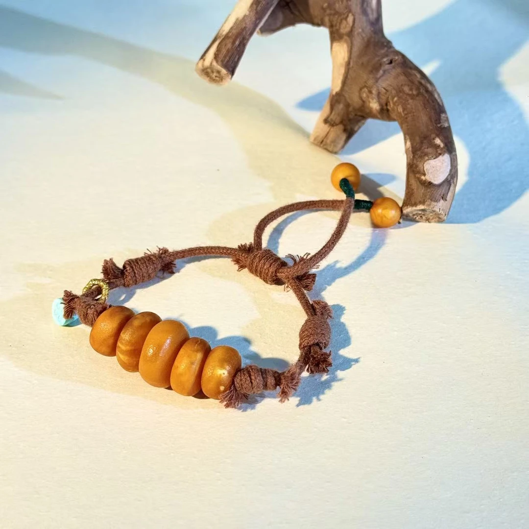 天然琥珀蜜蜡 满蜡藏收级*五福饼子藏式手工编织手绳