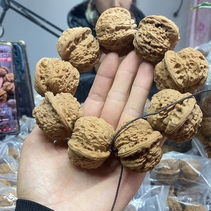 文玩核桃把件44血麒麟手持