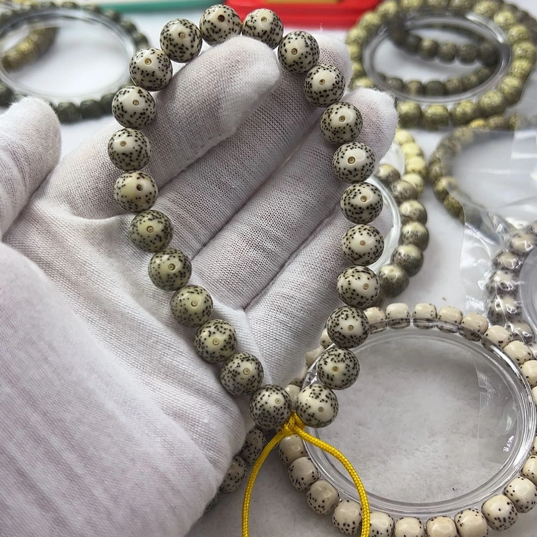 星月菩提手串10青花大眼睛圆珠手持  桌上