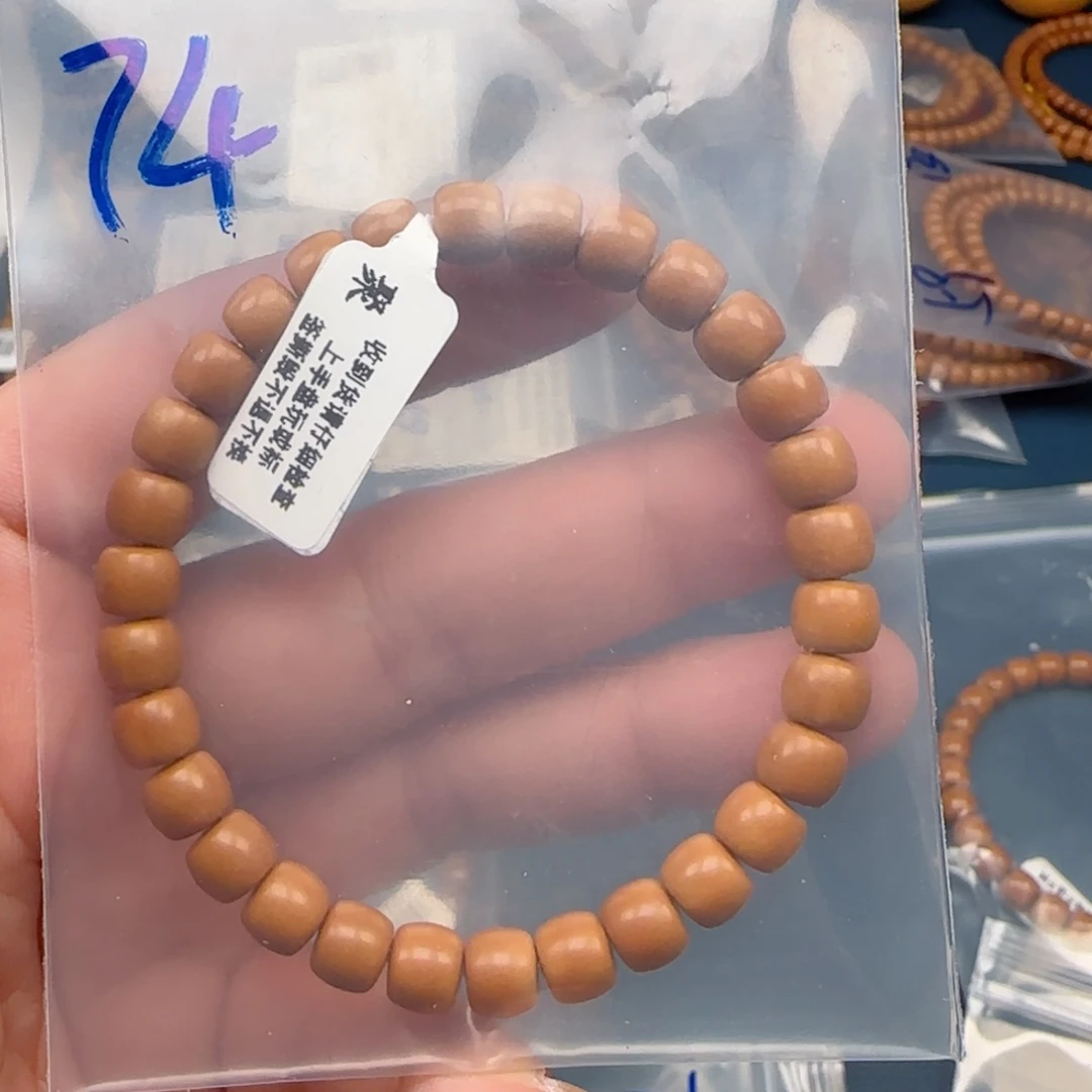 ****.手串橄榄核老挝SSS级核尖极限弧尺寸7.4