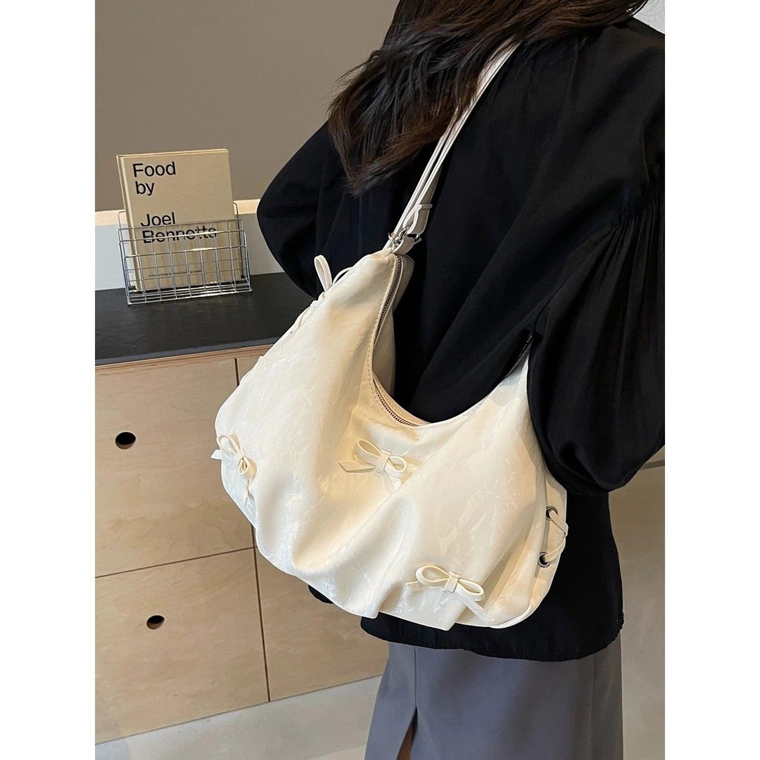 休闲通勤大容量女士双肩包2025新款出游旅行后背包多