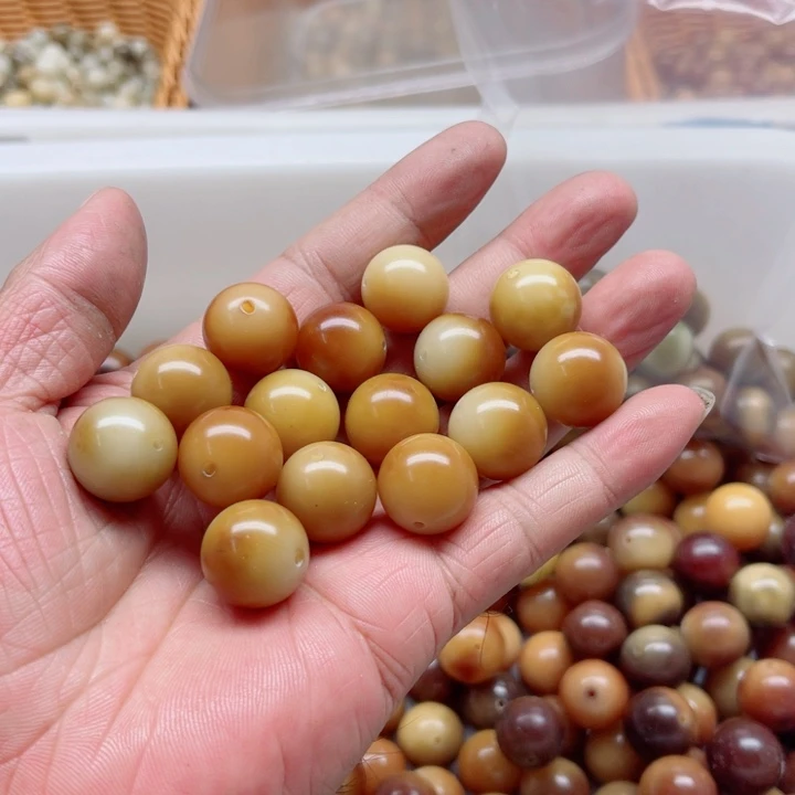 在***间吊坠白玉菩提16焦糖圆珠15