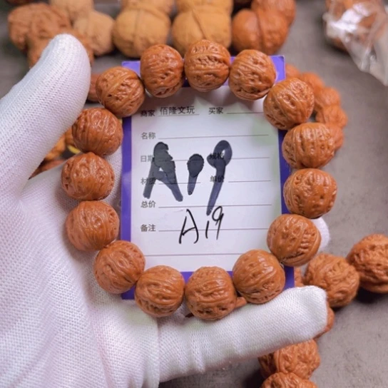 文玩核桃吊坠海**空核桃手串