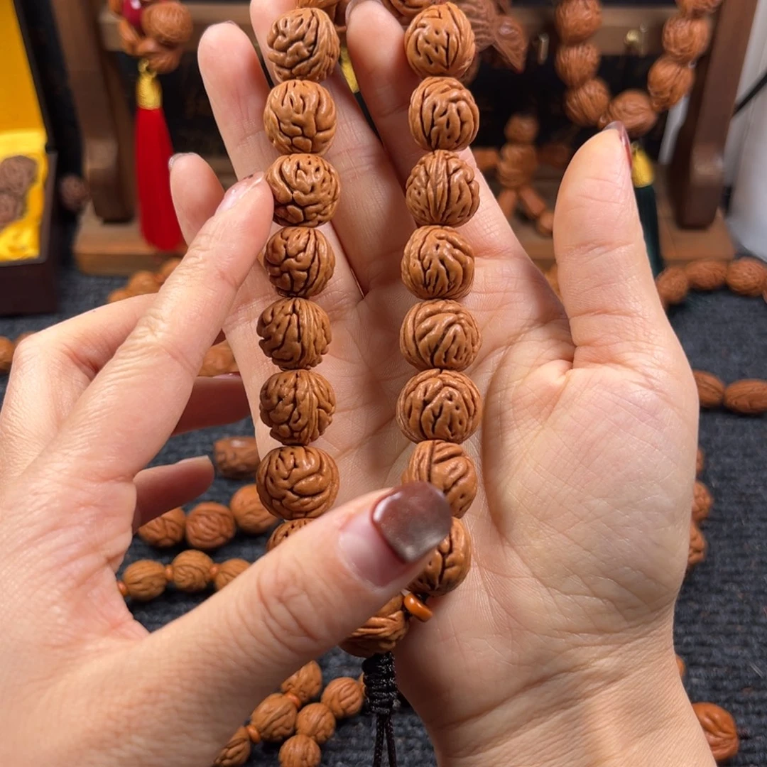 吊坠桃核桃枭手持L7