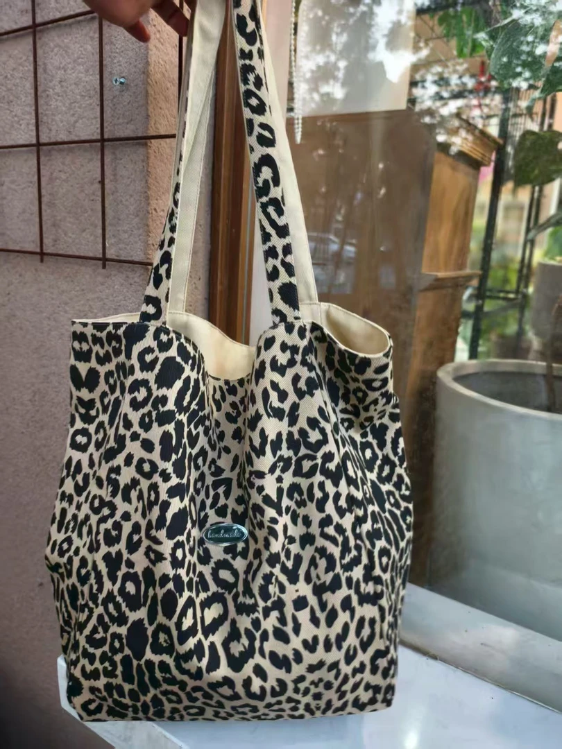 豹纹帆布包包女2025秋季新款学院风百搭托特包大容量学生大托特包