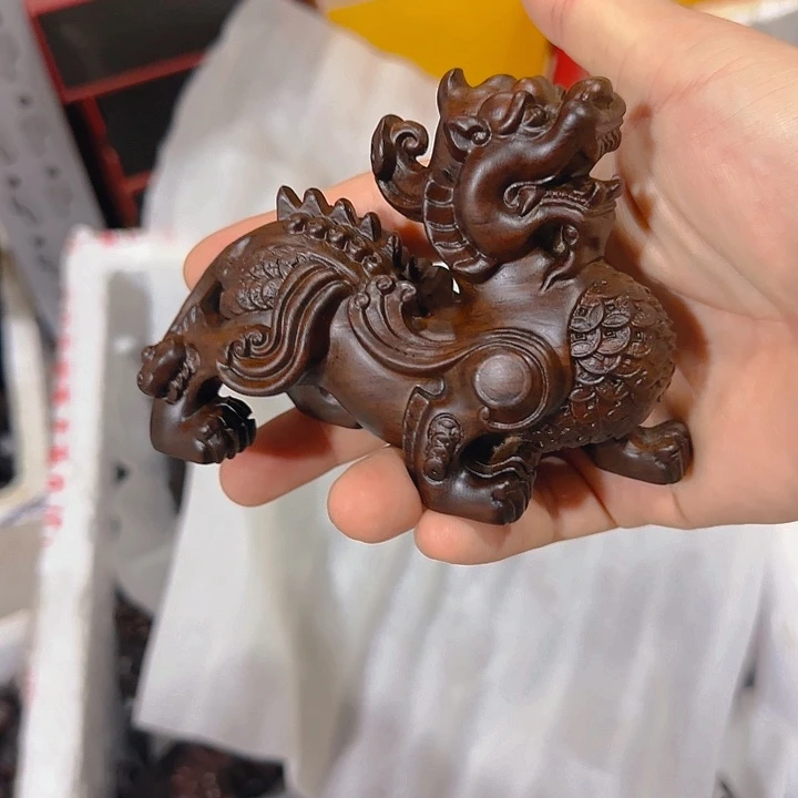 木黑檀木12金钱貔貅一只