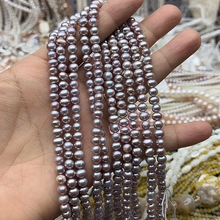 玛瑙/玉髓未镶嵌珠宝半成品一条5-6mm左右紫珍珠椭圆