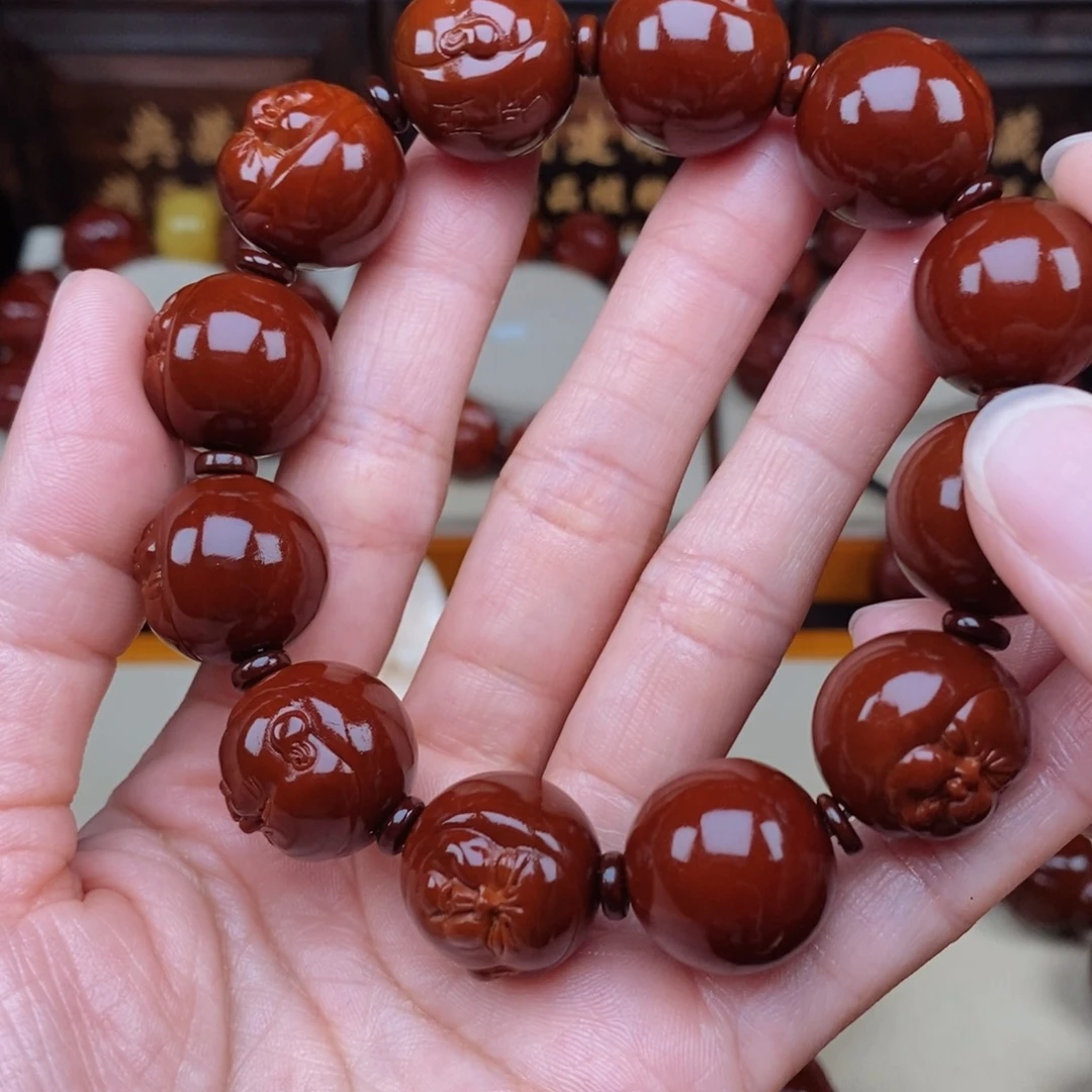 人***钱橄榄核吊坠人生百态