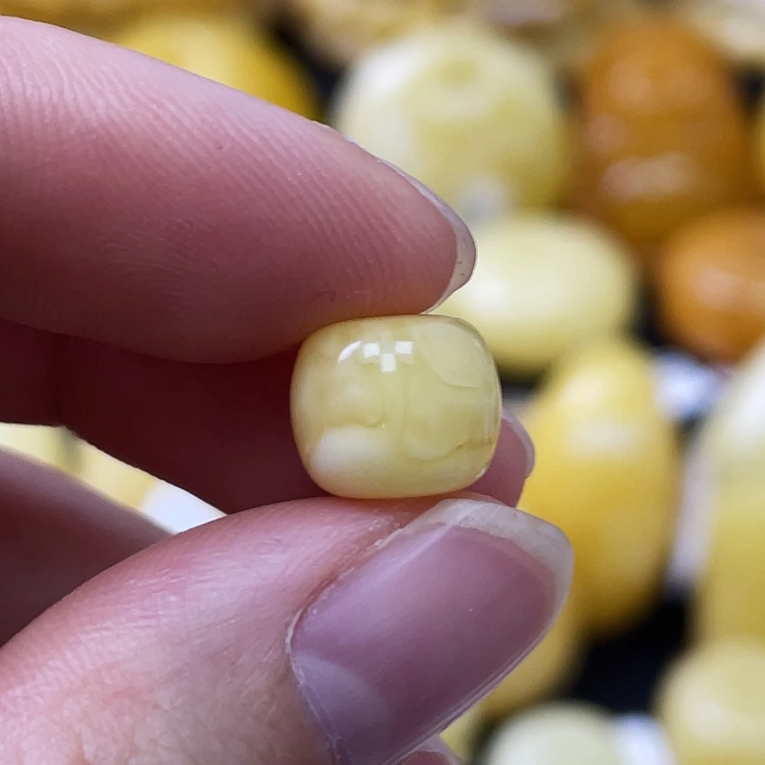 琥珀未镶嵌珠宝奇石10*8.5mm浓蜡妖花 瑕疵福利