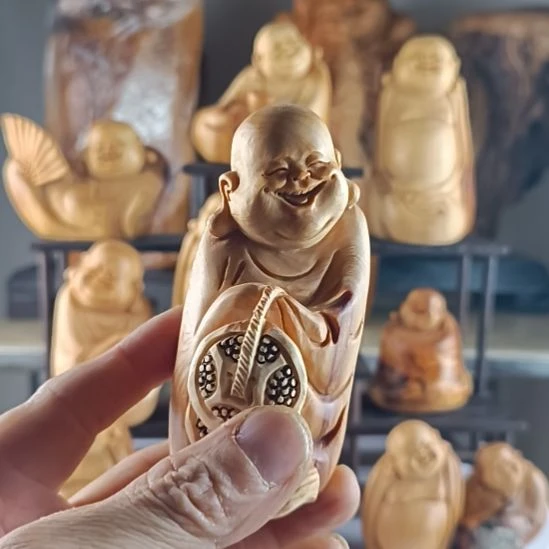 钊***沐香榧木崖柏弥勒手把弥勒