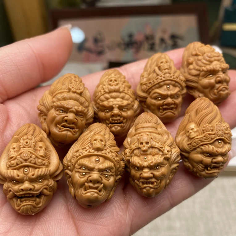 八大明王镶嵌款橄榄核雕刻