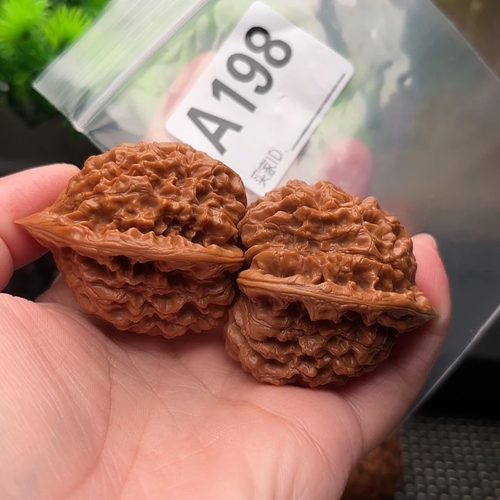 玮***玮桃核把件核桃管帽43