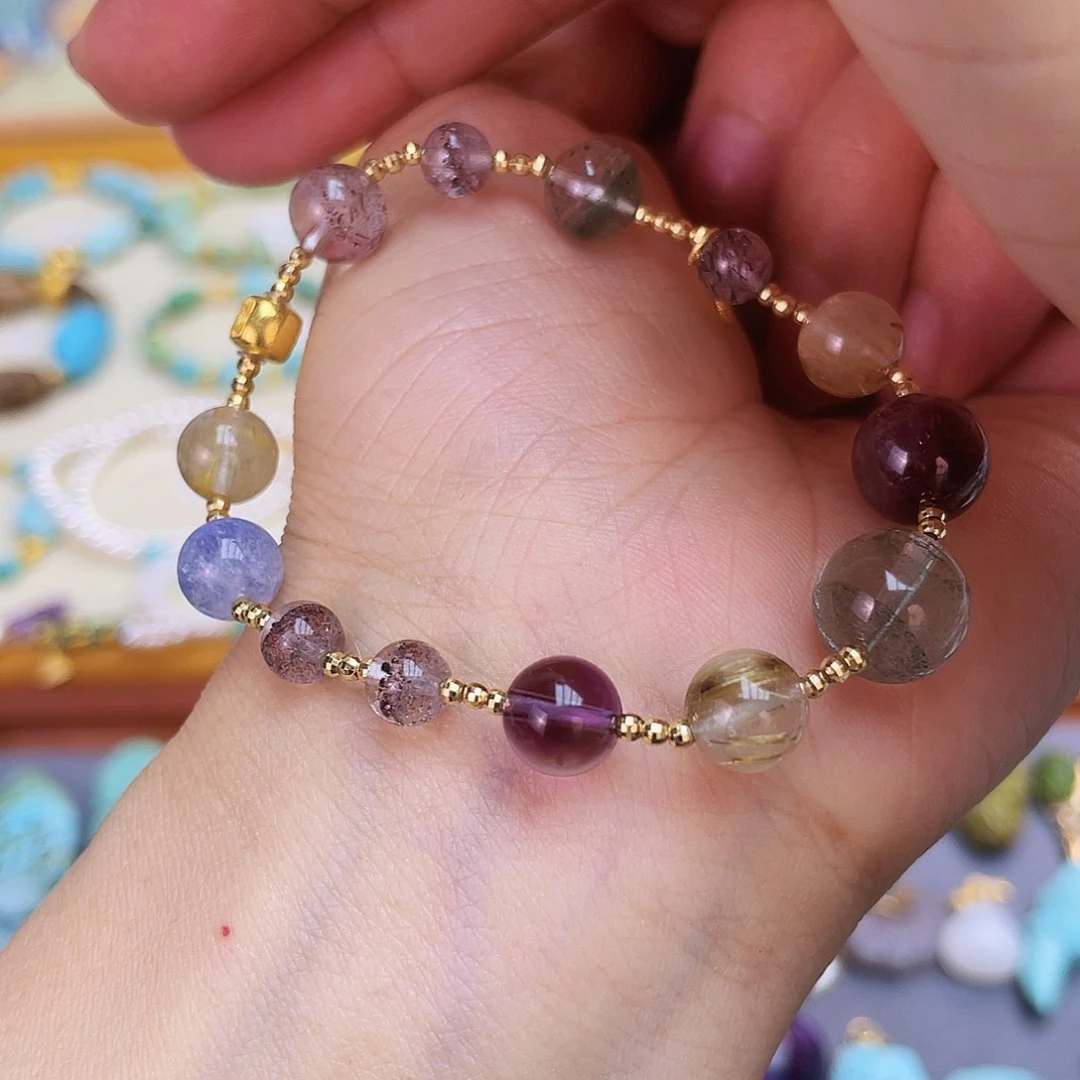 水晶吊坠(赠链)18K金镶嵌泰****?