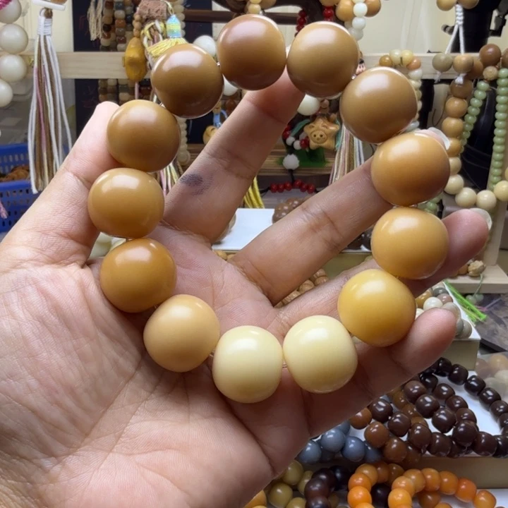 鱼***间手串菩提根/象牙果卡20天然干磨渐变