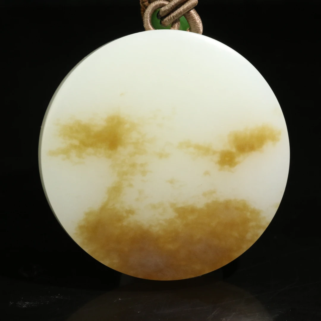 24和田玉糖白圆形无事牌/100427保利厦门拍卖