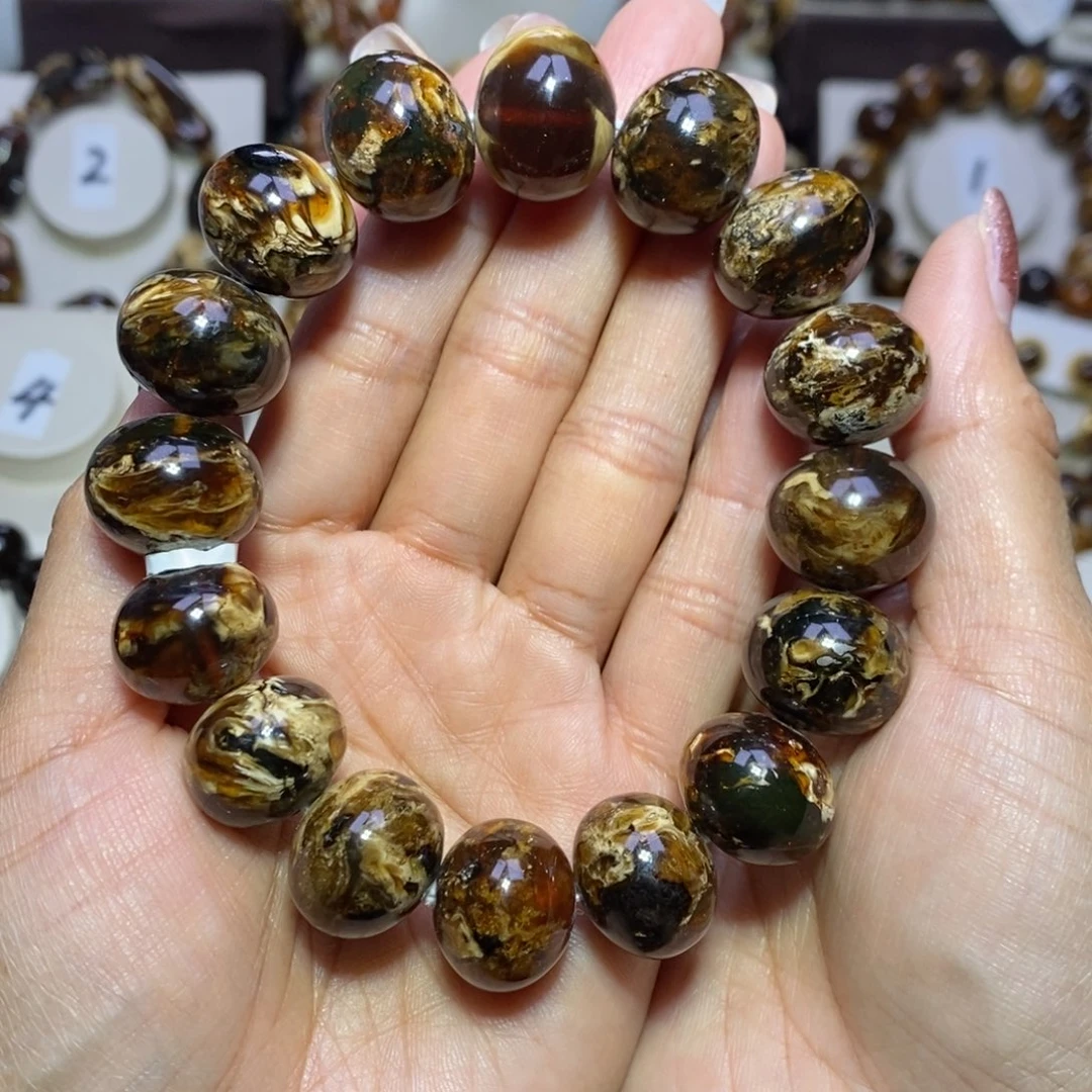 M***生琥珀未镶嵌裸石熊猫花17+