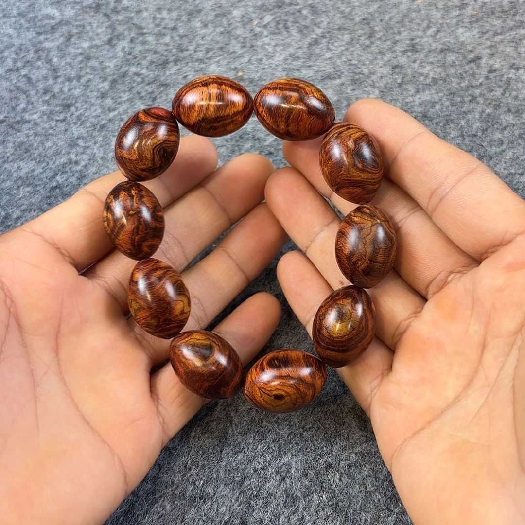 王***波黄花梨/降香黄檀手工天珠型紫油梨