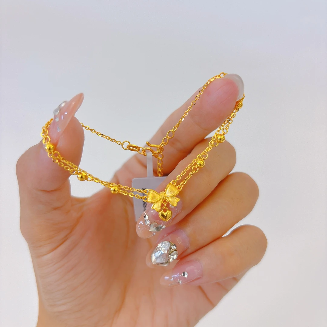 【禧丰金】足金999 双链光珠蝴蝶结黄金手链