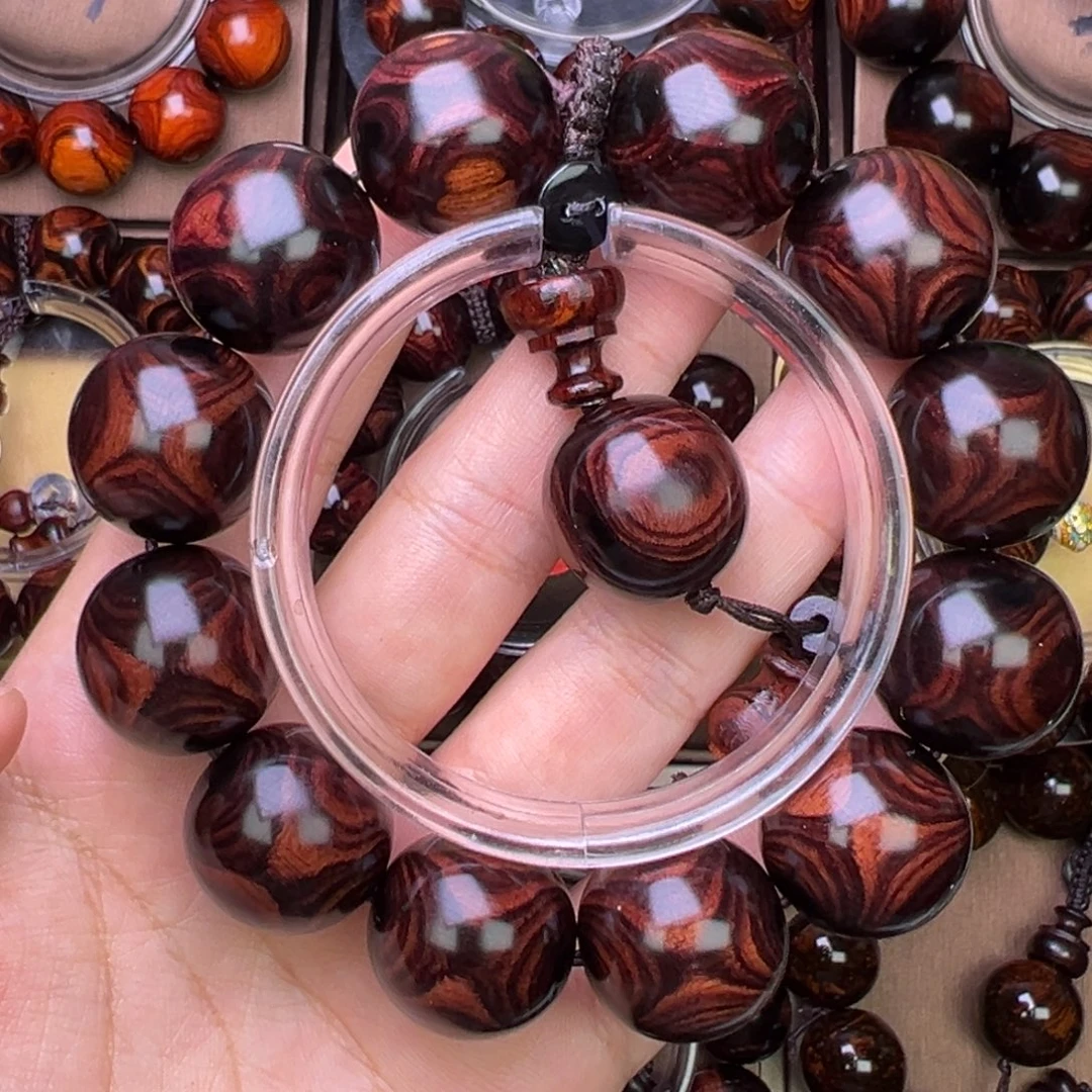 定***拉木质类黄花梨鬼脸对眼成品手串