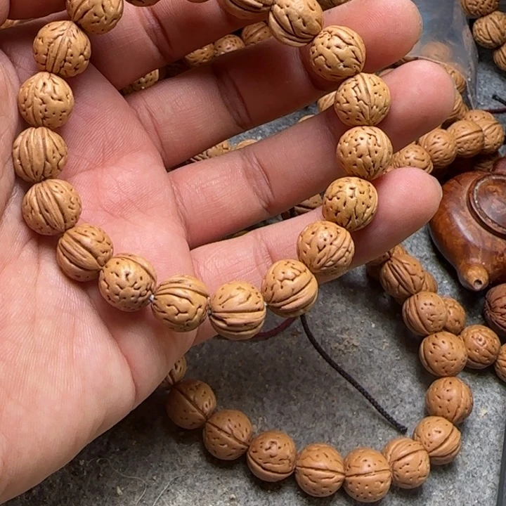 6*?肌肉纹手串一条野生桃核