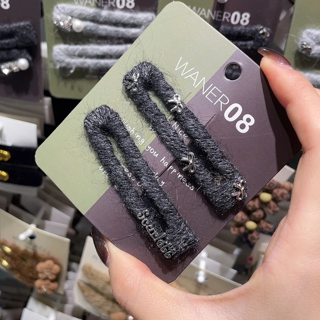 皮质非金属深灰方形蝴蝶结
