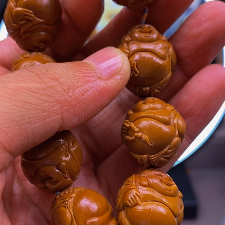 橄榄核吊坠杨杨杨杨哟。           图图图图