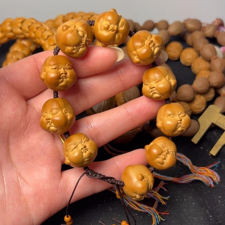 手串橄榄核人生百态