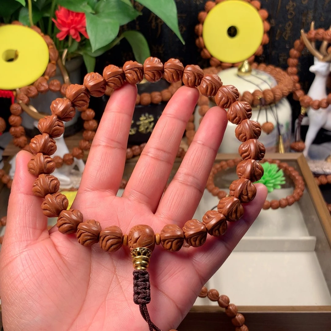峰***赚桃核吊坠双脊龙新品手持14