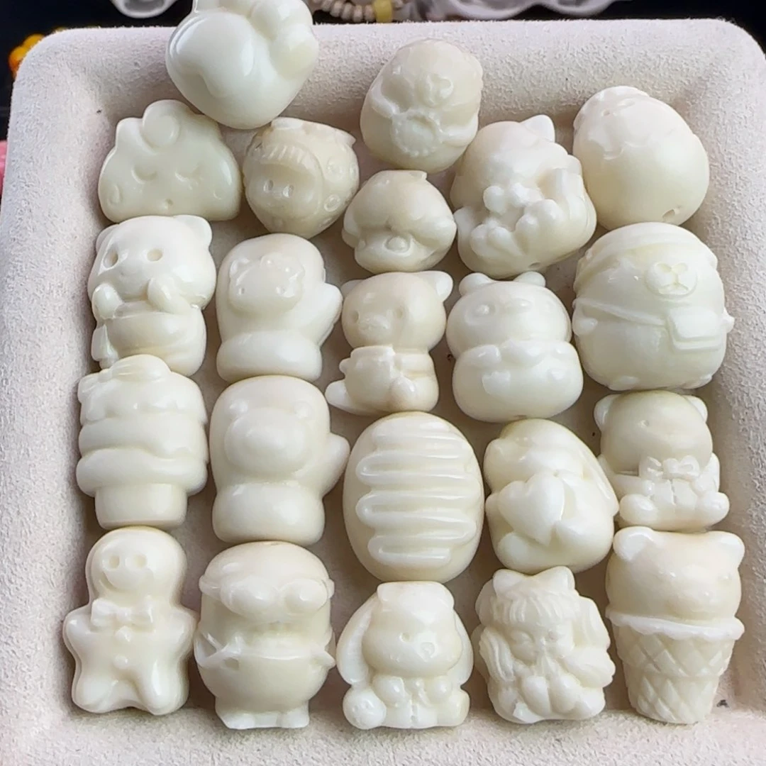 菩提根/象牙果吊坠全品牙果白色雕刻件10颗混（备注）