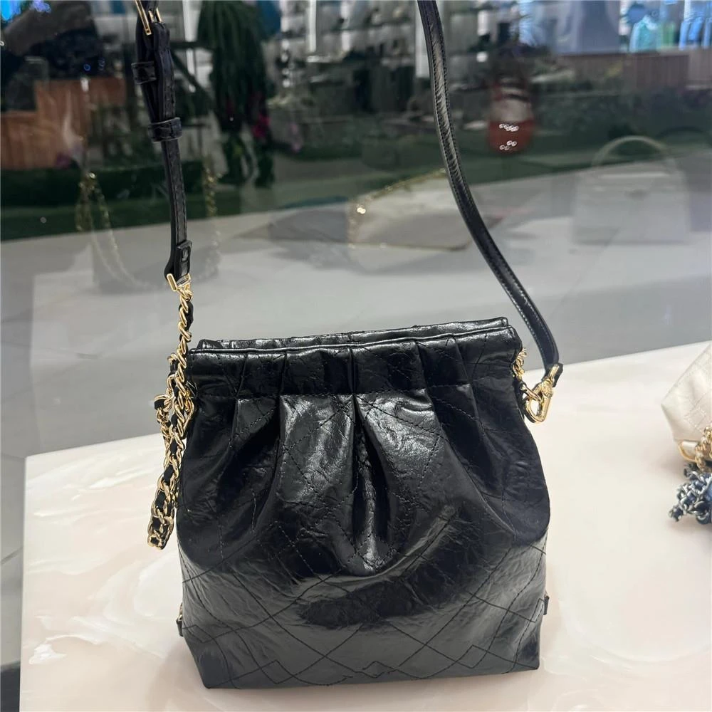 2024新款垃圾袋流浪包迷你双肩包大容量子母包斜挎单肩链条腋下包