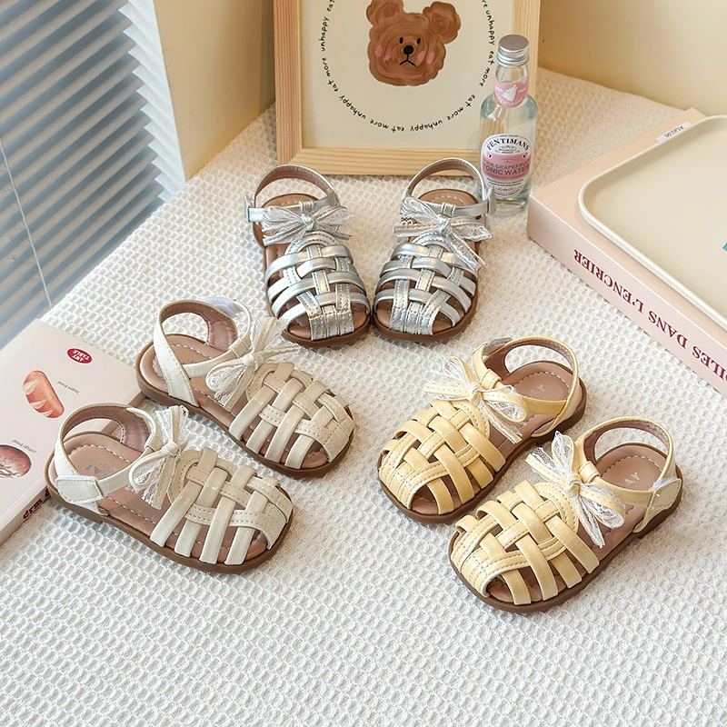 2025夏季新款儿童编织蕾丝蝴蝶结小清新凉鞋小女孩百搭公主沙滩鞋