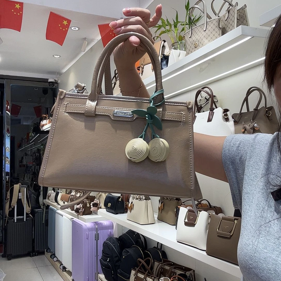 牛剖层皮革稻草人斜跨女包单肩手提包