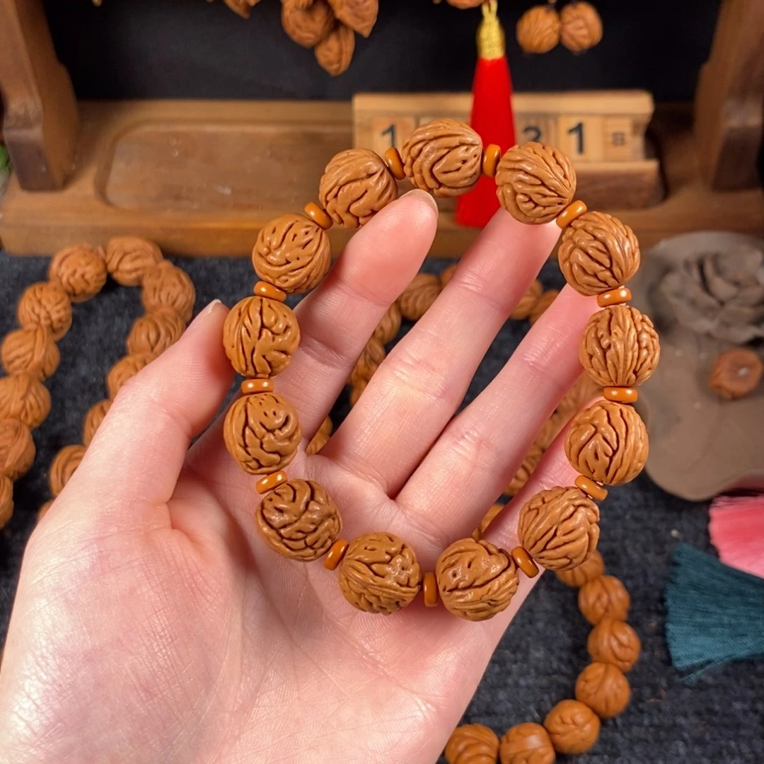 吊坠桃核桃枭手串