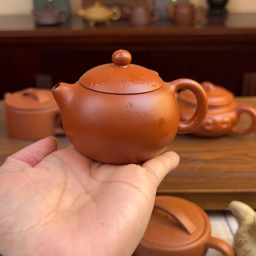莫***妙茶壶紫砂朱泥西施半手瑕品110cc