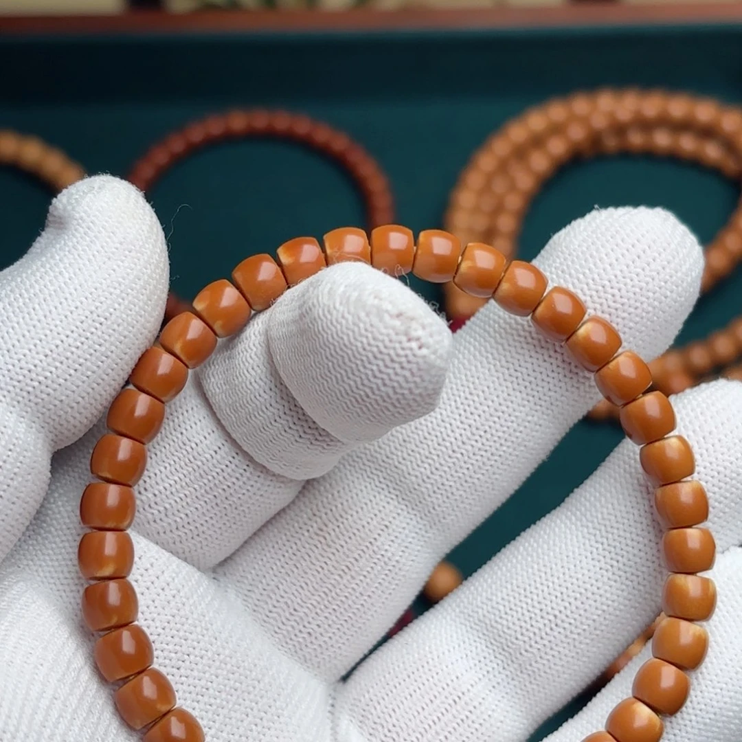 橄榄核手串.****.核尖老挝红6.0微白单圈