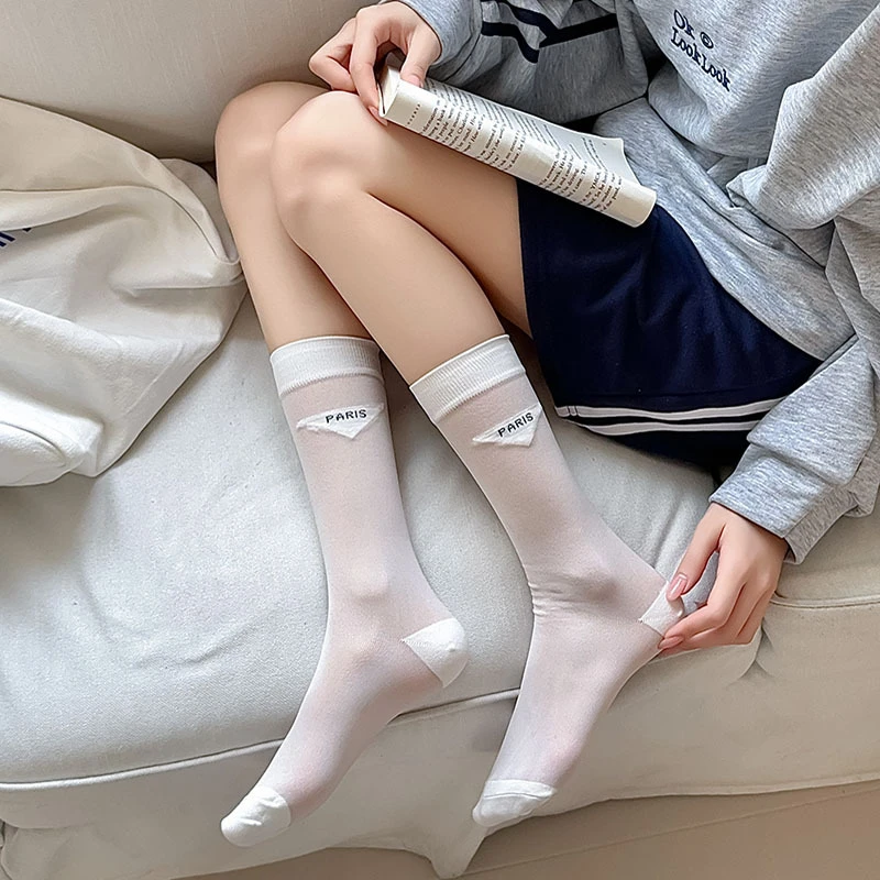 新款字母三角标时尚潮袜女中筒堆堆袜春夏欧美走秀透明网纱袜子女