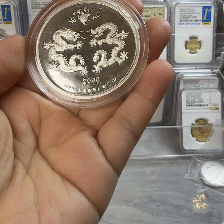 孟***儿纯银上海电站银章无盒证
