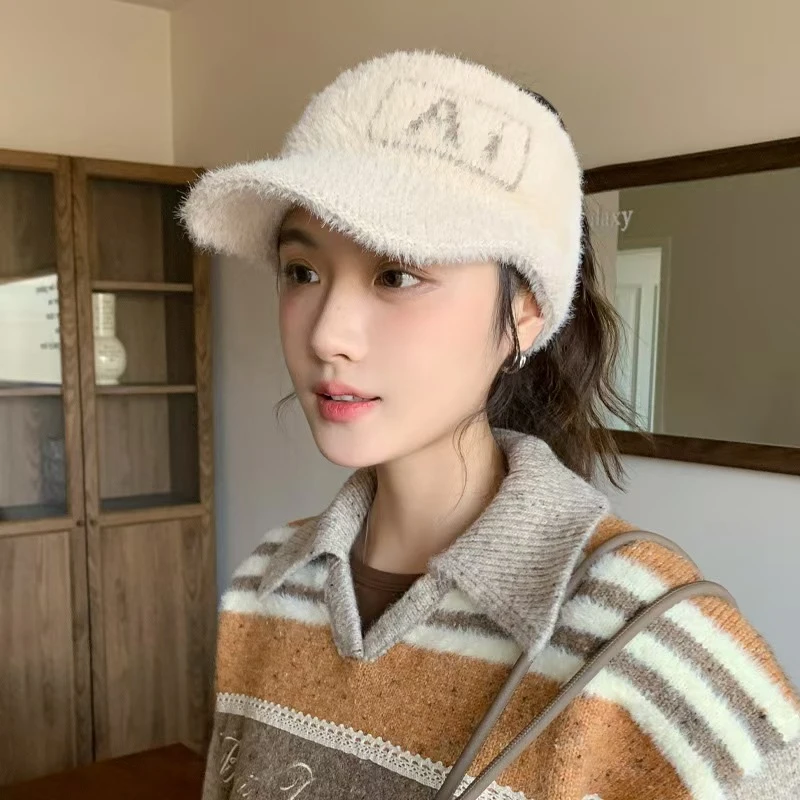 韩版春秋冬季棒球帽子女新款百搭鸭舌帽针织毛线帽保暖护耳马尾帽