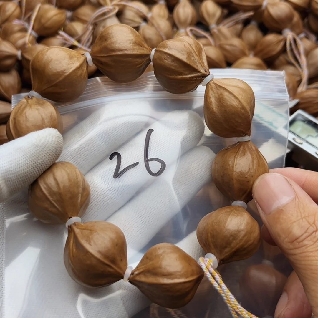 橄榄核手串/手链26号，2.5×2.7四花