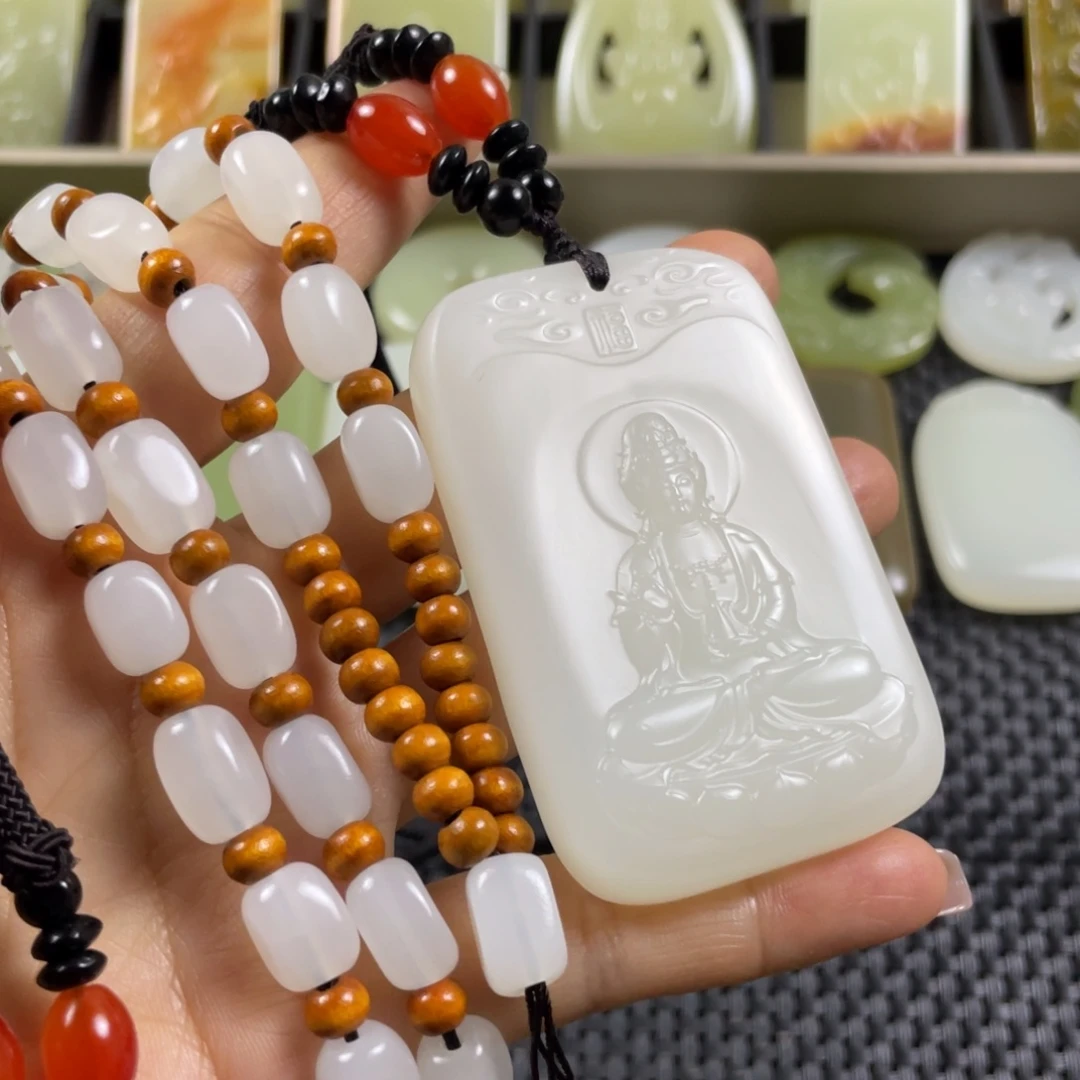 用***9石材观音挂件一物一拍