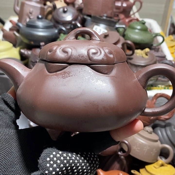 紫砂茶壶翘盖流口水