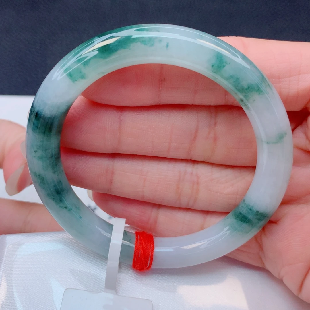 翡翠未镶嵌手镯52圆条 冰飘蓝绿花有纹