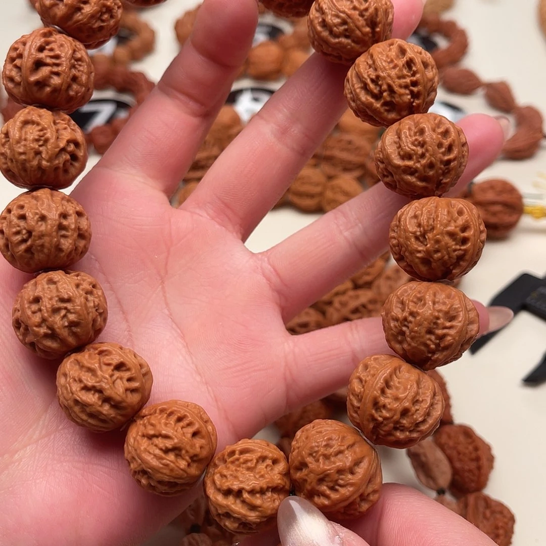 天***云文玩核桃吊坠京八棱手持