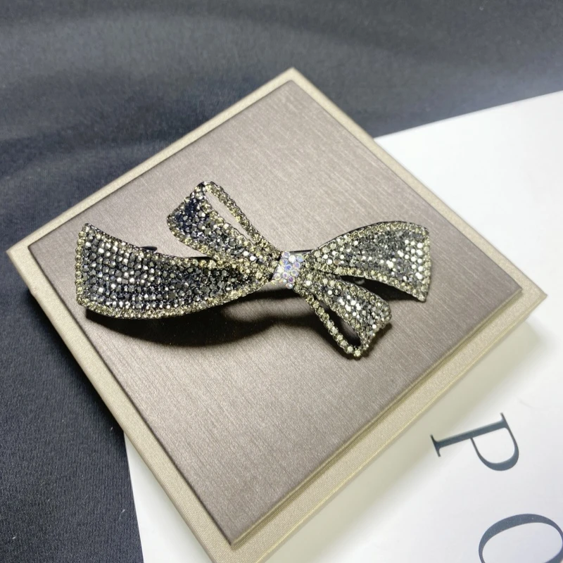 L352矿灰色蝴蝶结弹簧夹