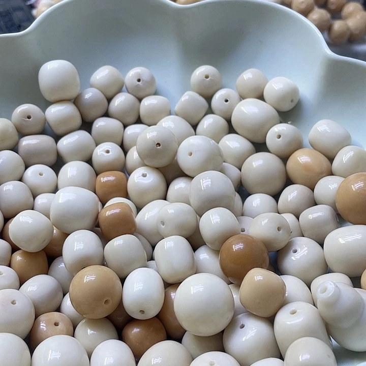 白玉菩提吊坠微瑕象牙果桶15/20十颗