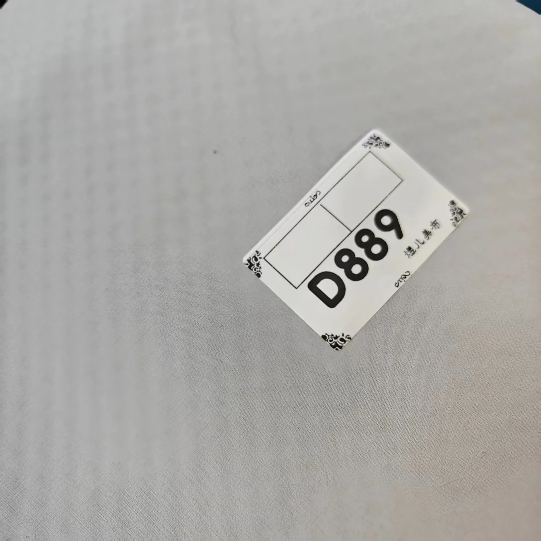 889浅灰色小蕉蜂窝热皮加绒软壳冲锋衣布料