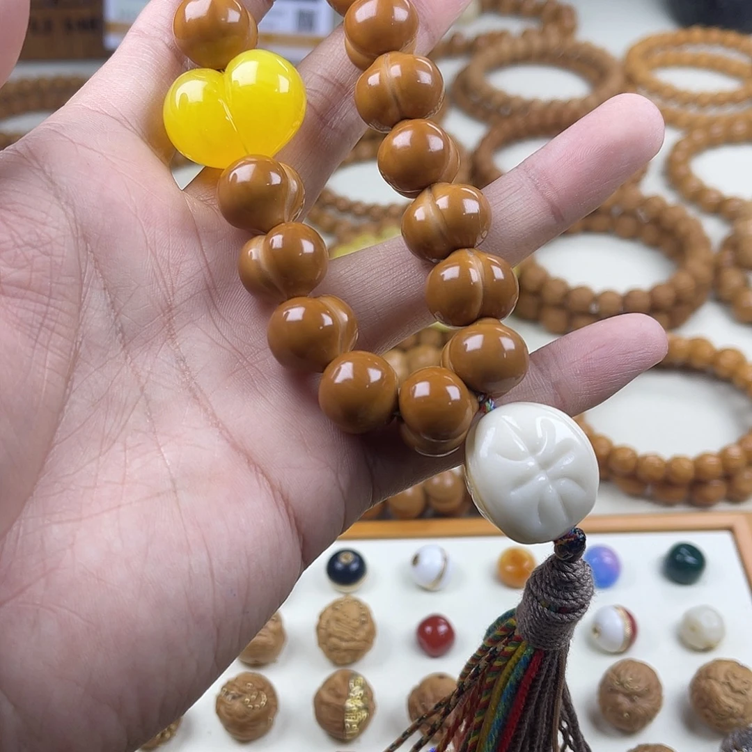 柒***-猴头核桃手串屁桃套装